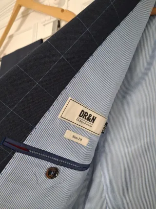 Traje de hombre a cuadros azul y gris