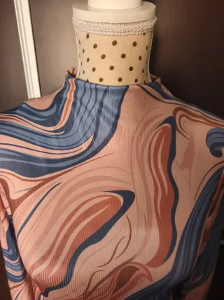 Body estampado cuello alto manga larga