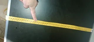 Estufa de leña negra con horno sin usar