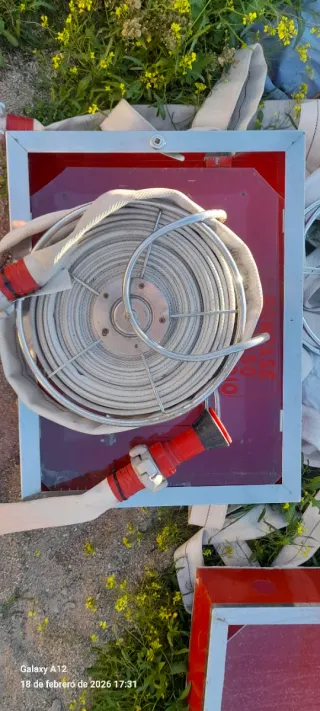 Manguera bomberos con cajón
