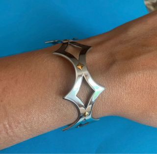 Bracciale rigido acciaio con oro 750