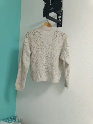 Jersey de punto beige con rombos