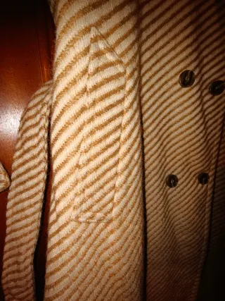 Casaco comprido com padrão listrado