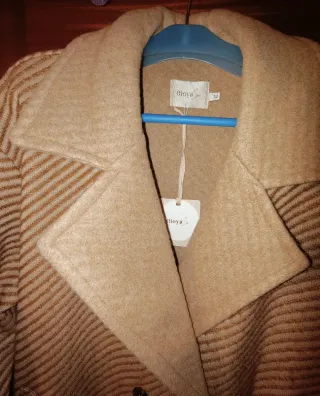 Casaco comprido com padrão listrado