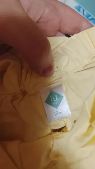 Pichi amarillo con botones