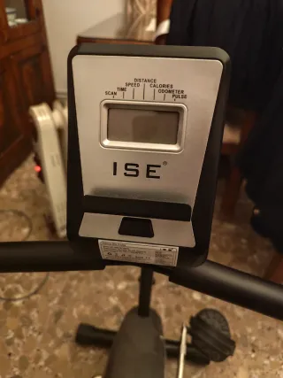 Bicicleta estática con respaldo