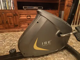 Bicicleta estática con respaldo