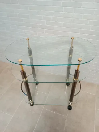 Mesa auxiliar cristal y metal dorada