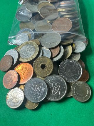 L#581 0,8 Kilos de monedas mundiales