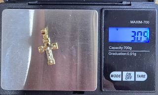 Cruz de oro 18k 3.04g