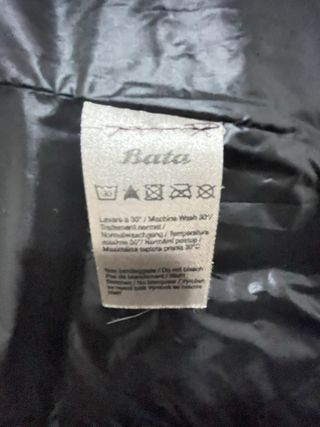 Piumino nero con perline