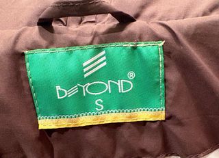 Abrigo plumífero largo mujer