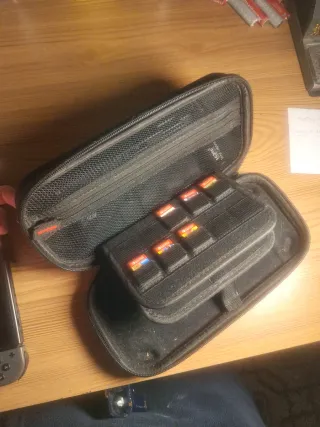 Nintendo Switch Negra con juegos, funda y  mas!!