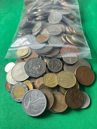 L#584 1,2 Kilos de monedas mundiales