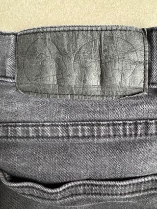 Jeans Cheap Monday skinny neri strappati