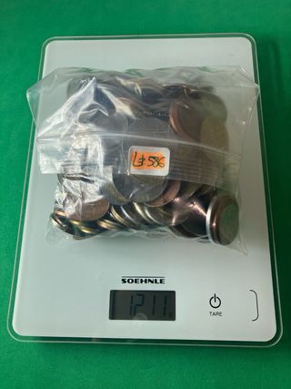 L#586 1,2 Kilos de monedas del mundo