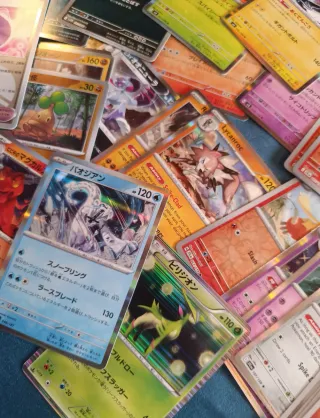 Lotto circa 50 Carte Pokémon Giapponesi con Poncho