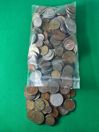 L#587 1,5 Kilos de monedas mundiales
