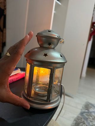 Candelabro de metal y cristal plateado