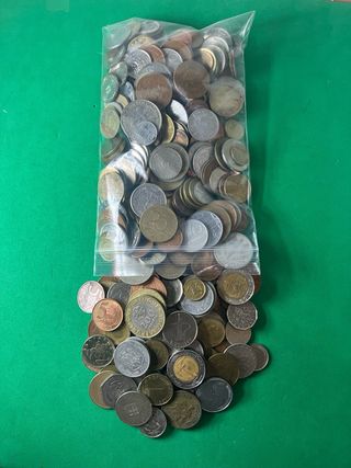 L#588 1,5 Kilos de monedas de diferentes paises