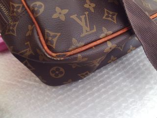 bolso louis reportr en lona monogram cuero natural