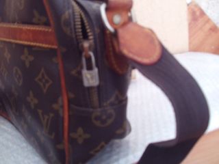 bolso louis reportr en lona monogram cuero natural