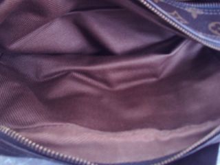 bolso louis reportr en lona monogram cuero natural