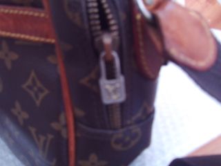 bolso louis reportr en lona monogram cuero natural