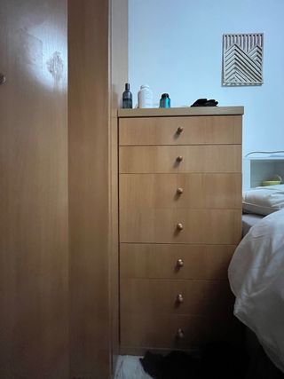 Cómoda de madera con 7 cajones