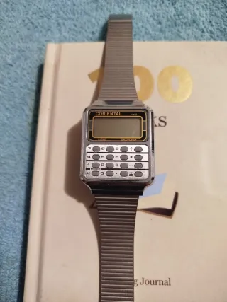 Reloj Calculadora CORIENTAL Gris/Plata