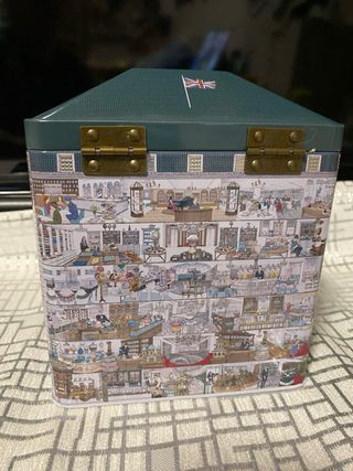 Caja de lata decorada y tan bien hucha