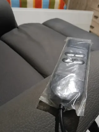 Sillón reclinable y elevable gris