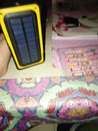 Luz LED portátil y carga móvil