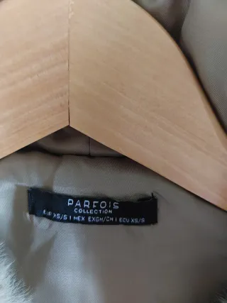 Bomber de pelo con capucha