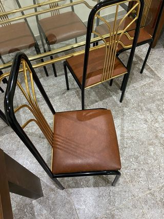 Mesa cristal y 6 sillas metal dorado