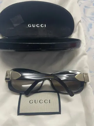 Gafas de sol Gucci negras y marrones