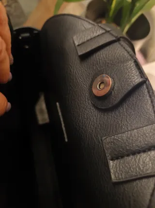 Bolso polipiel negro y marrón estampado cebra