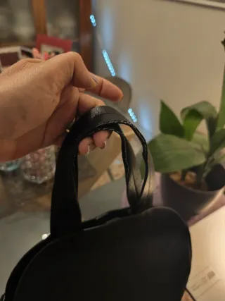Bolso polipiel negro y marrón estampado cebra