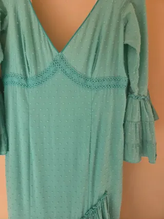 Traje de flamenca verde con volantes