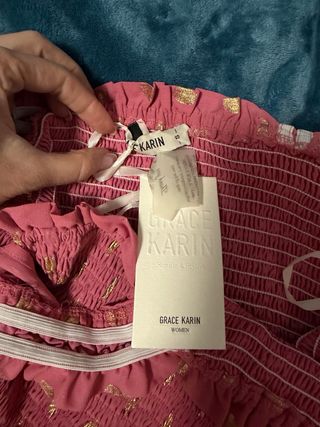 Vestido largo rosa con detalles dorados