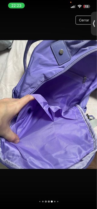 Mochila morada con monedero