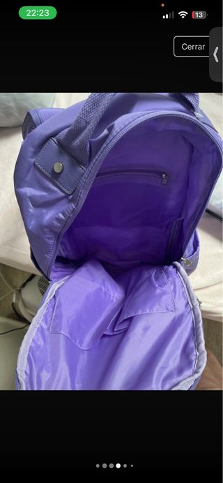 Mochila morada con monedero