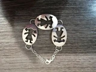 Pulsera de plata con figuras