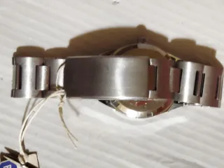 Reloj WIKAR Unisex de cuerda Dorado y Plateado