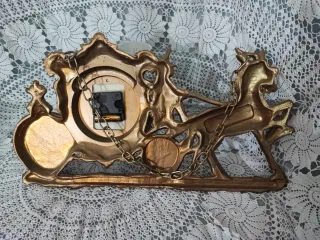 Reloj vintage carroza dorada