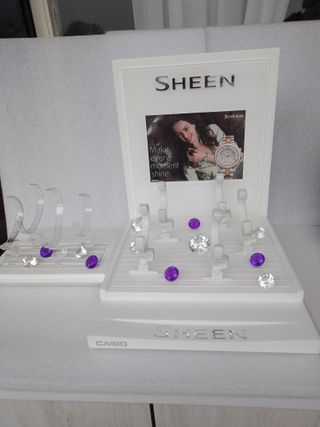 4 EXPOSITORES CASIO Y 1 TITAN