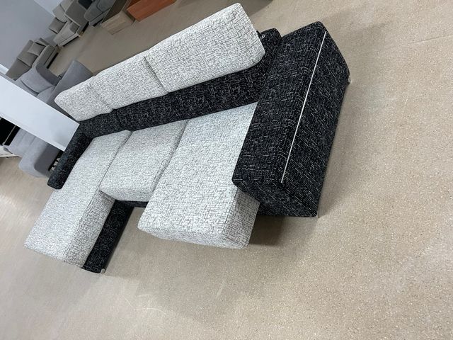 Sofá chaise longue con asientos deslizantes
