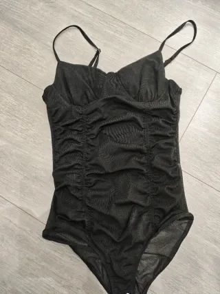 Body negro con transparencias