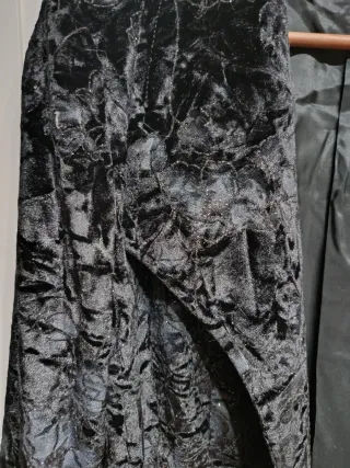 Chaqueta fiesta negra con brillos plateados