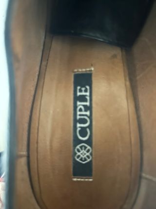 Botines de tacón negros de piel con cordones